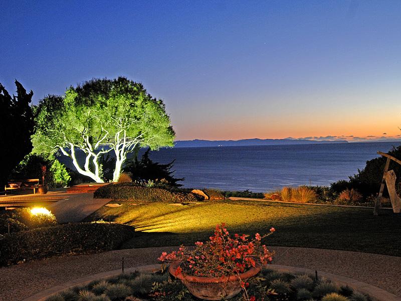 4347 Marina Drive Santa Barbara, CA 93110 - Photo 7 of 11 a view of a swimming pool with an outdoor seating and a yard
