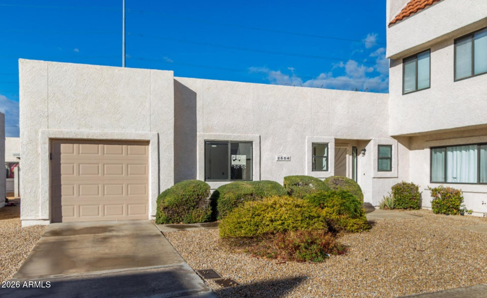 2554 West Kathleen Road Phoenix, AZ 85023 - Photo 2 of 22 a view of a house with a yard