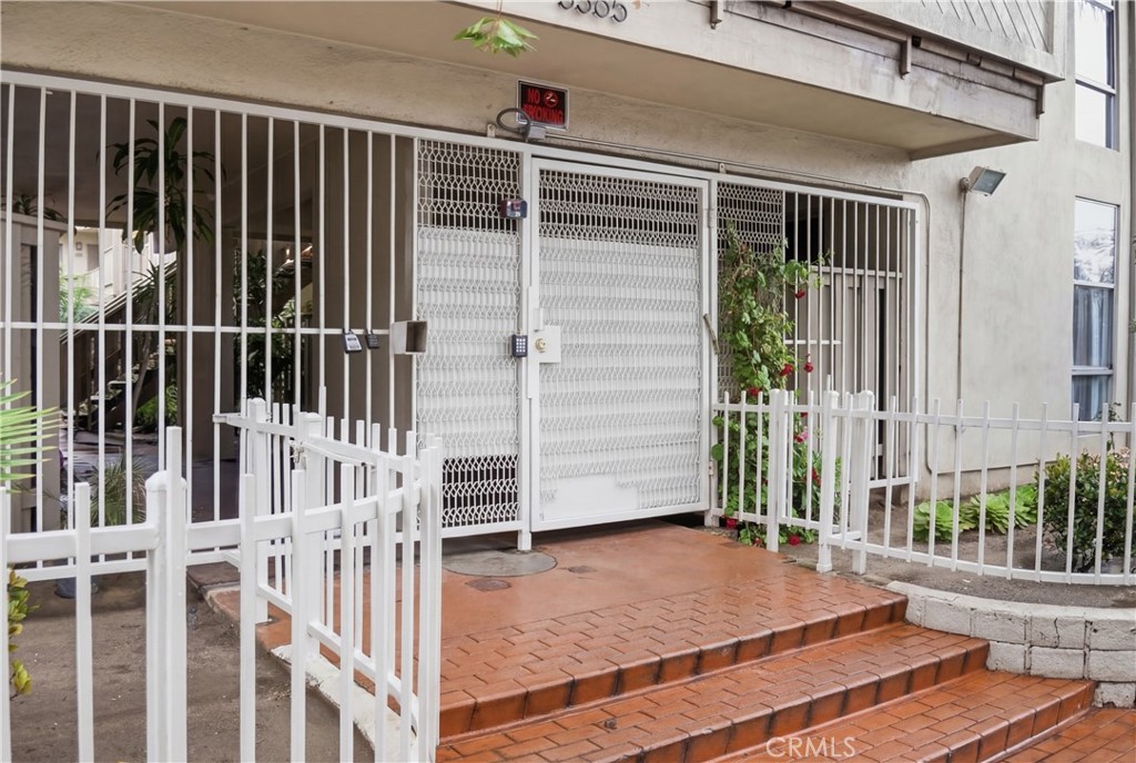 a view of a balcony with door