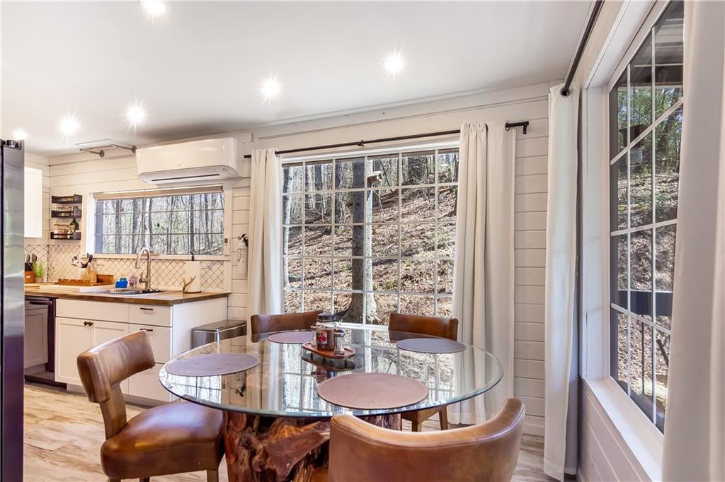 2308 Carver Mill Road Talking Rock, GA 30175 - Photo 16 of 33 a dining room with furniture and window