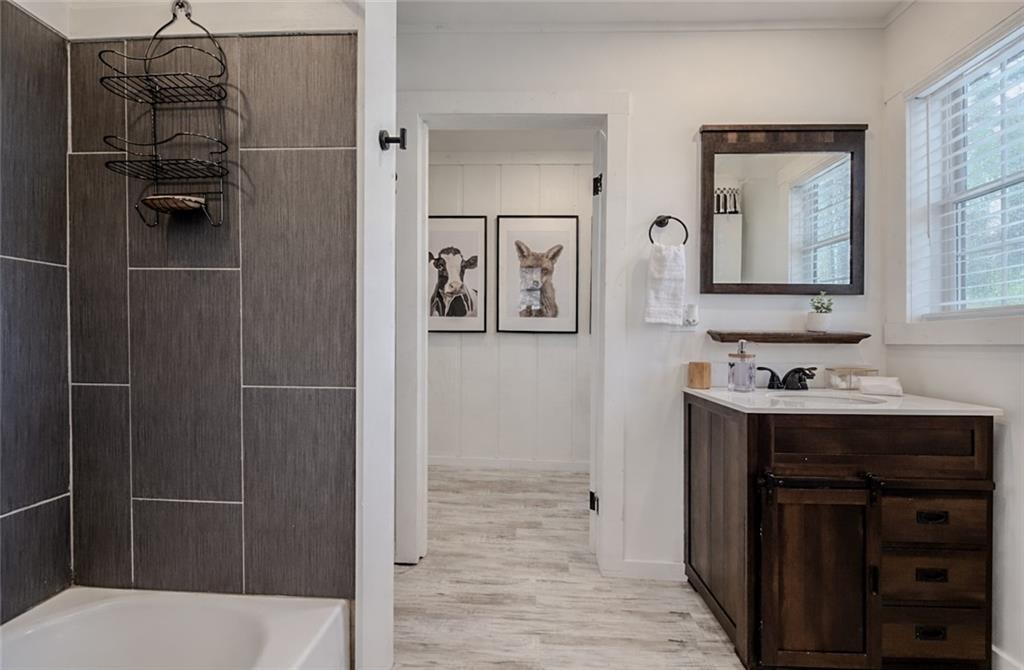 2308 Carver Mill Road Talking Rock, GA 30175 - Photo 23 of 33 a bathroom with a sink toilet and shower