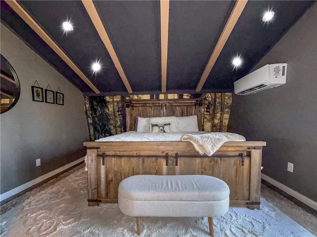 2308 Carver Mill Road Talking Rock, GA 30175 - Photo 27 of 33 a bed room with a bed and a lamp