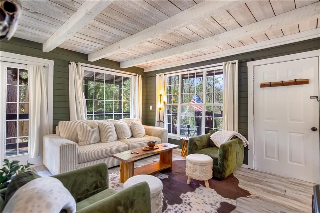 2308 Carver Mill Road Talking Rock, GA 30175 - Photo 5 of 33 a living room with furniture and a large window