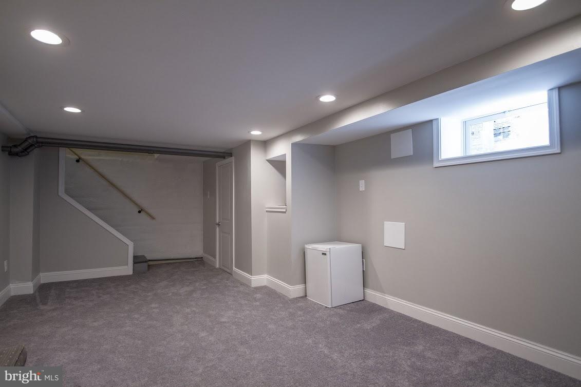 900 Overbrook Road Baltimore, MD 21239 - Photo 24 of 30 Recently finished lower level w/ half bath.