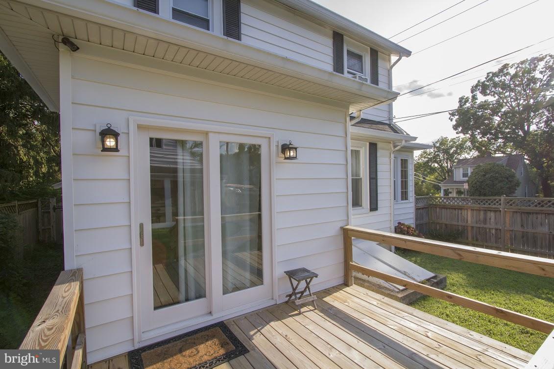 900 Overbrook Road Baltimore, MD 21239 - Photo 27 of 30 Deck off kitchen leads to large fenced yard