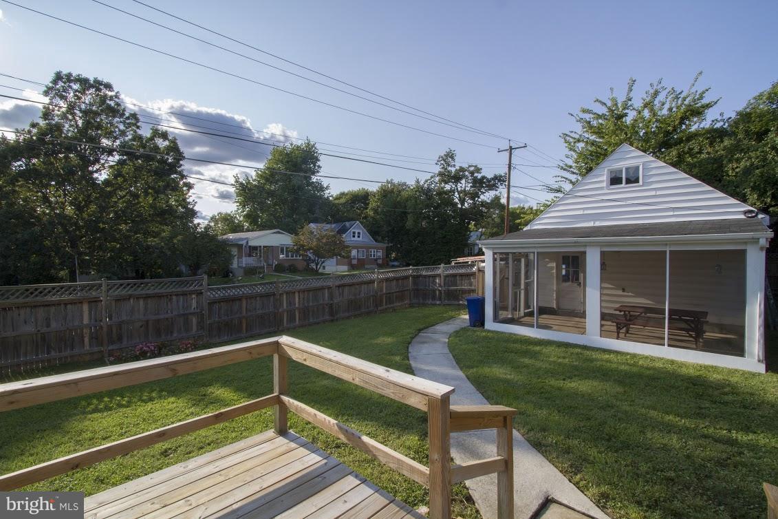 900 Overbrook Road Baltimore, MD 21239 - Photo 29 of 30 Screened porch and 3-car garage.