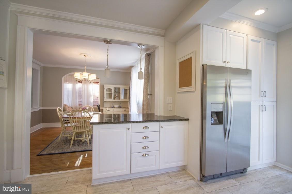 900 Overbrook Road Baltimore, MD 21239 - Photo 9 of 30 Kitchen open to dining room.