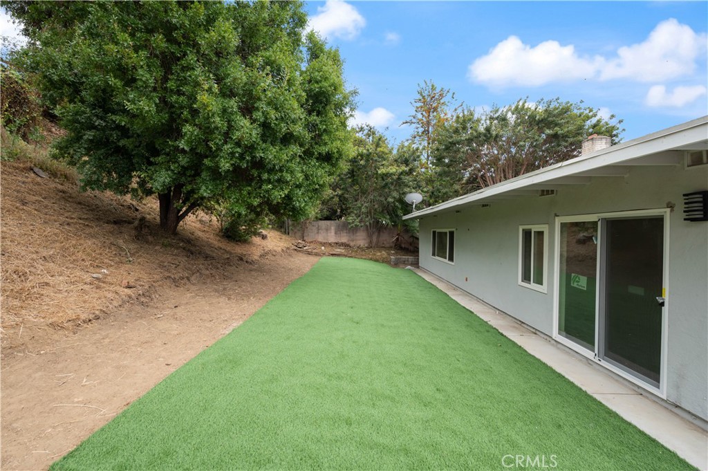 18578 Fieldbrook Street Rowland Heights, CA 91748 - Photo 18 of 20 a view of a backyard with a large tree
