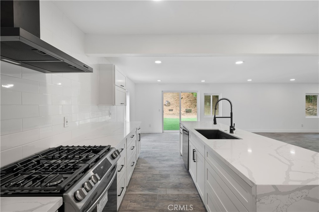 18578 Fieldbrook Street Rowland Heights, CA 91748 - Photo 7 of 20 a kitchen with sink a stove and a refrigerator