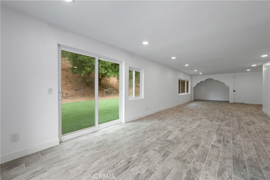 18578 Fieldbrook Street Rowland Heights, CA 91748 - Photo 10 of 20 a view of an empty room with wooden floor and a window