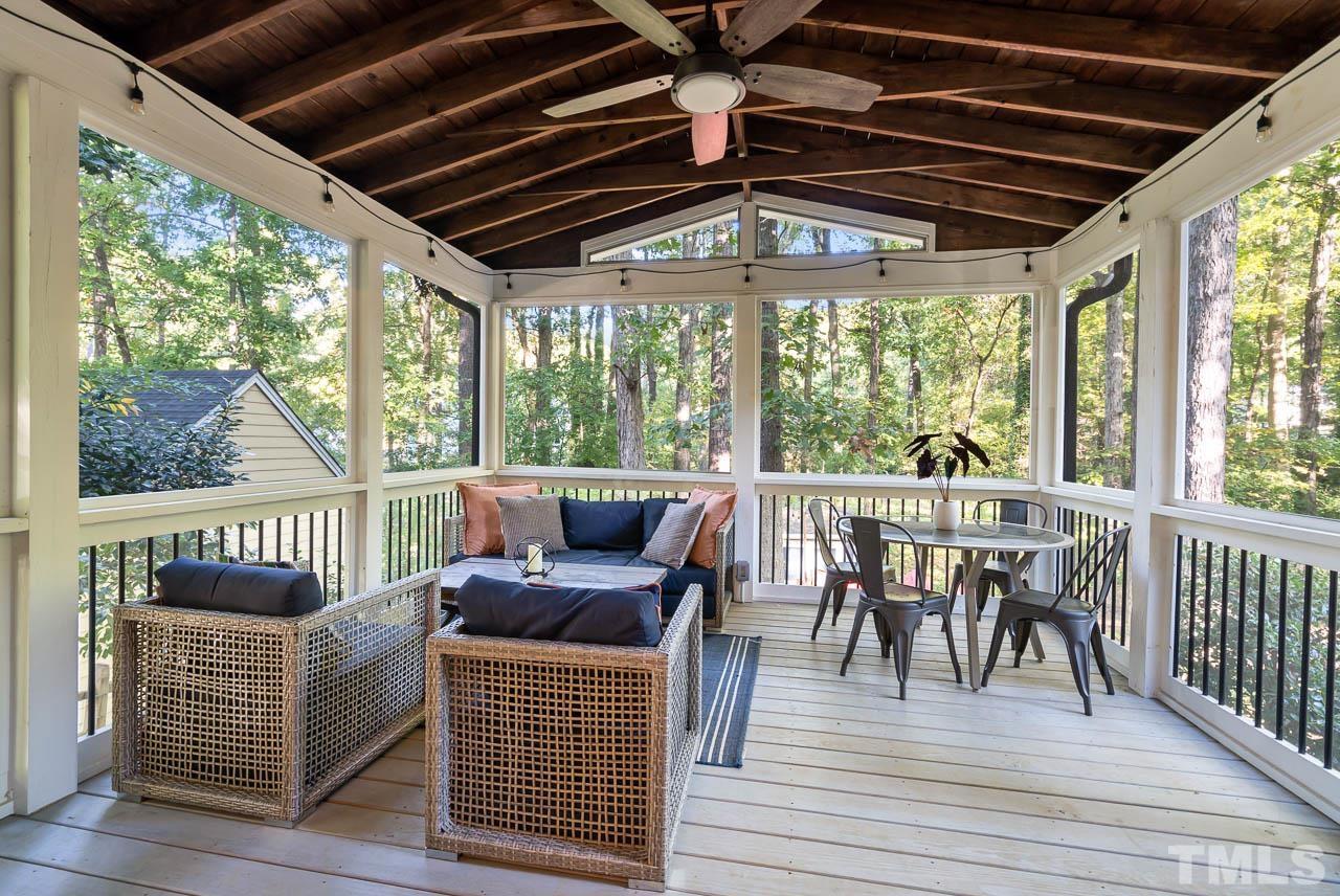 108 Donna Place Cary, NC 27513 - Photo 13 of 30 a view of a dining room with furniture wooden floor and balcony view