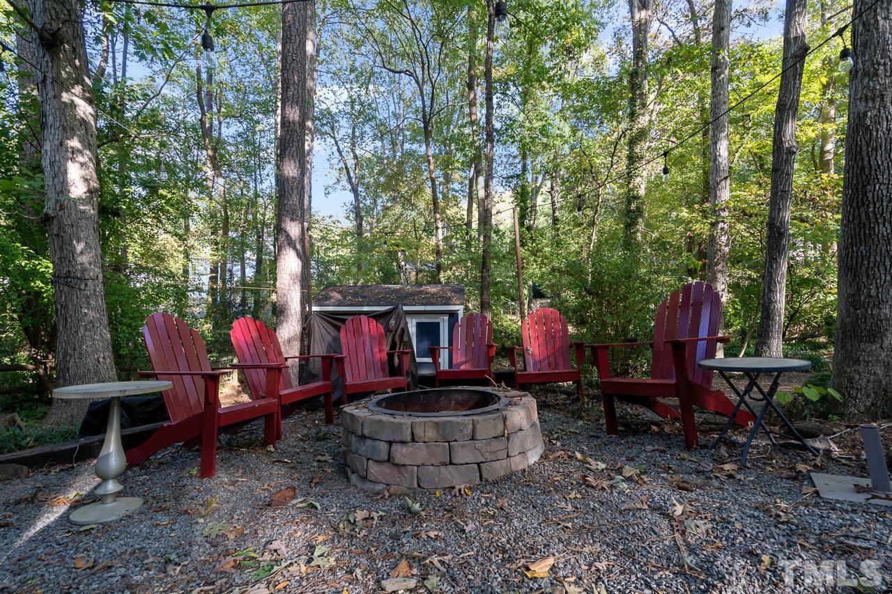 108 Donna Place Cary, NC 27513 - Photo 15 of 30 a view of a house with backyard and sitting area