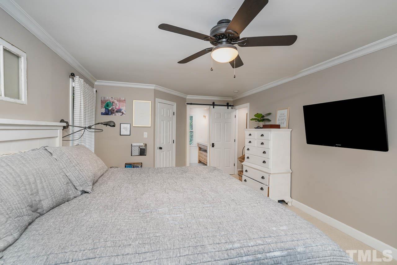 108 Donna Place Cary, NC 27513 - Photo 17 of 30 a view of a livingroom with a flat screen tv
