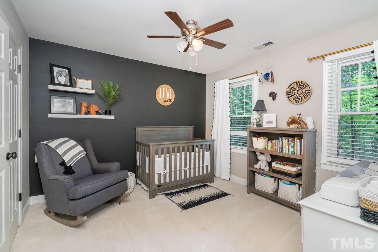 108 Donna Place Cary, NC 27513 - Photo 23 of 30 a living room with furniture and a large window