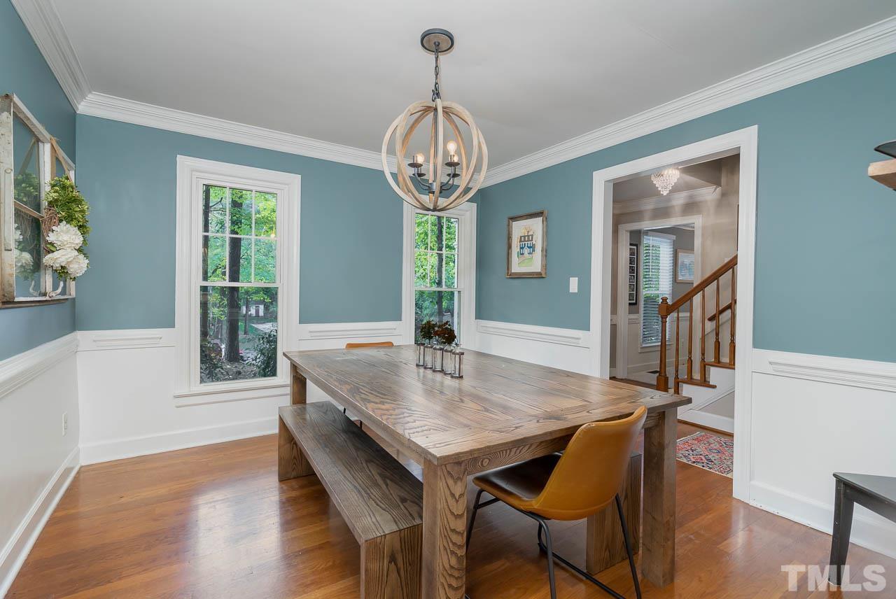 108 Donna Place Cary, NC 27513 - Photo 4 of 30 a view of a dining room with furniture window and wooden floor