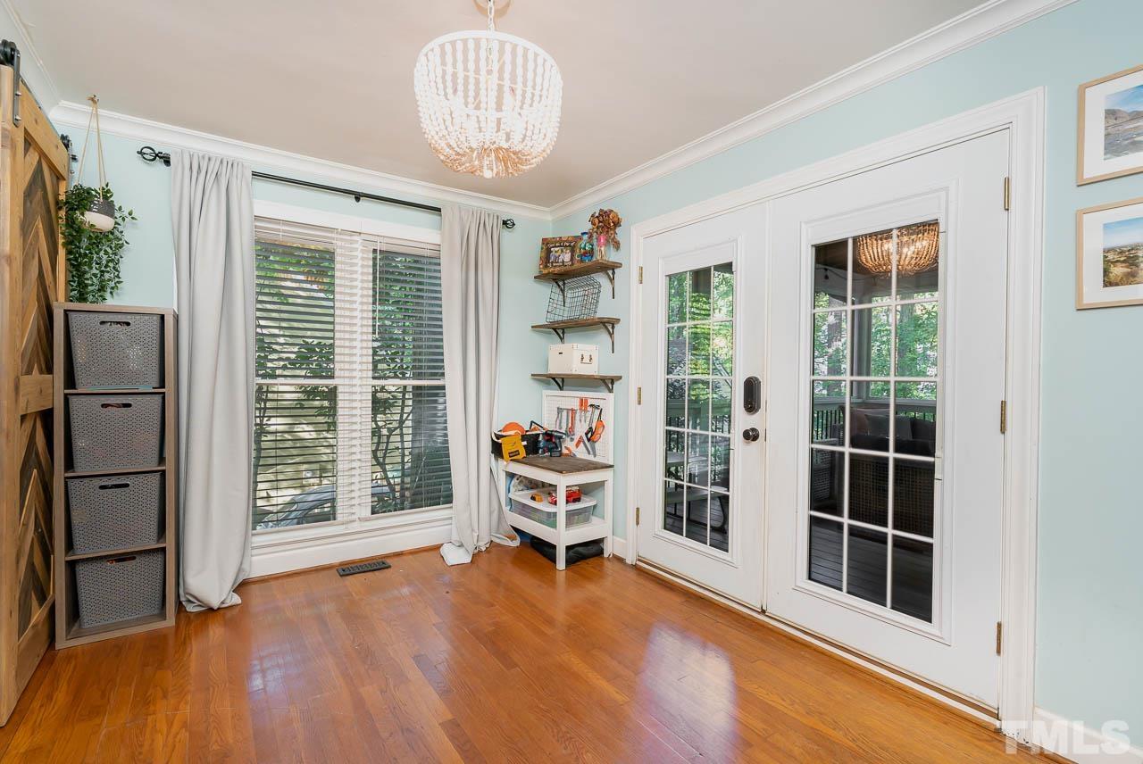 108 Donna Place Cary, NC 27513 - Photo 8 of 30 wooden floor in an empty room with a window