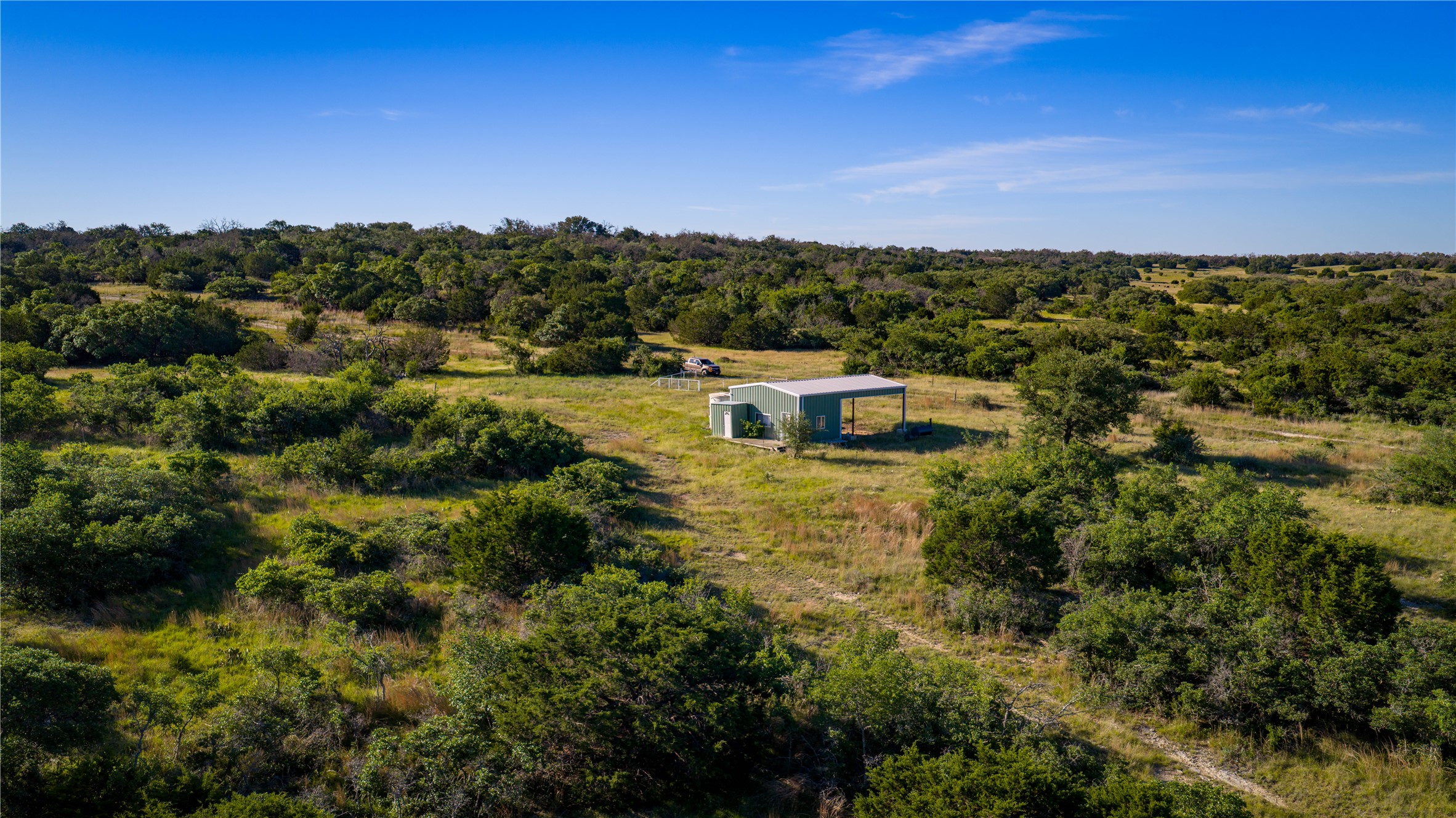 3276 Link Road Doss, TX 78618 - Photo 31 of 35 a aerial view of a house with a yard