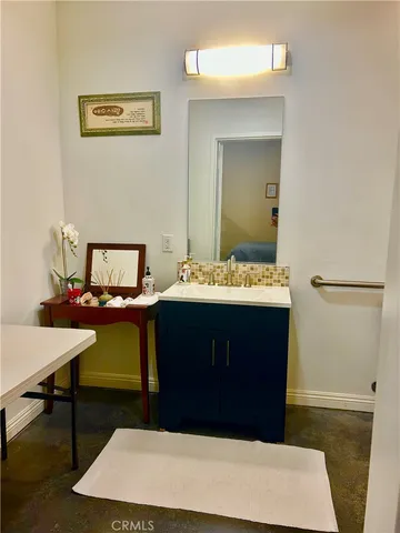 a bathroom with a sink and a toilet