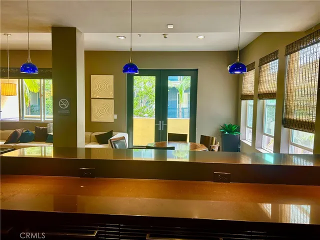 a patio with a patio table and chairs