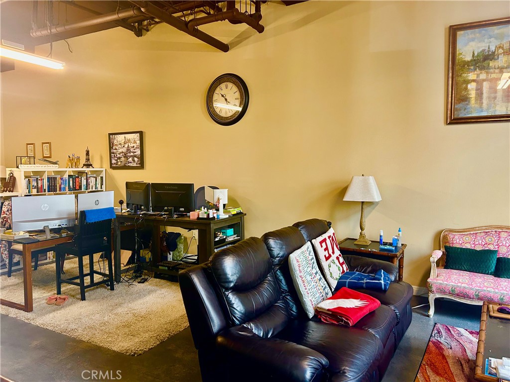 300 East 4th Street, Unit 101 Long Beach, CA 90802 - Photo 6 of 64 a view of a workspace with furniture