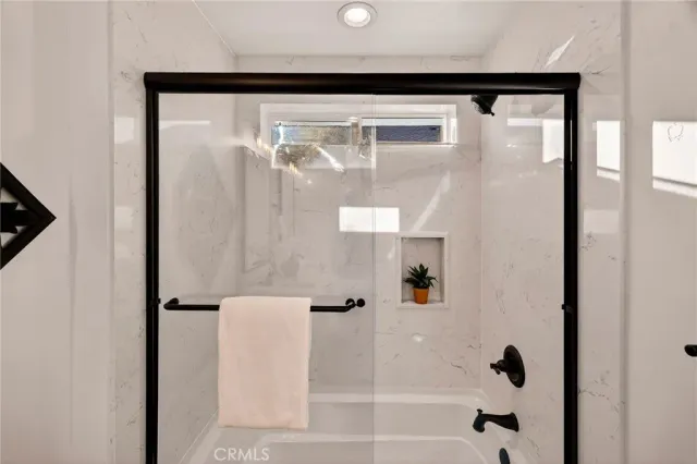 a room with furniture and a chandelier