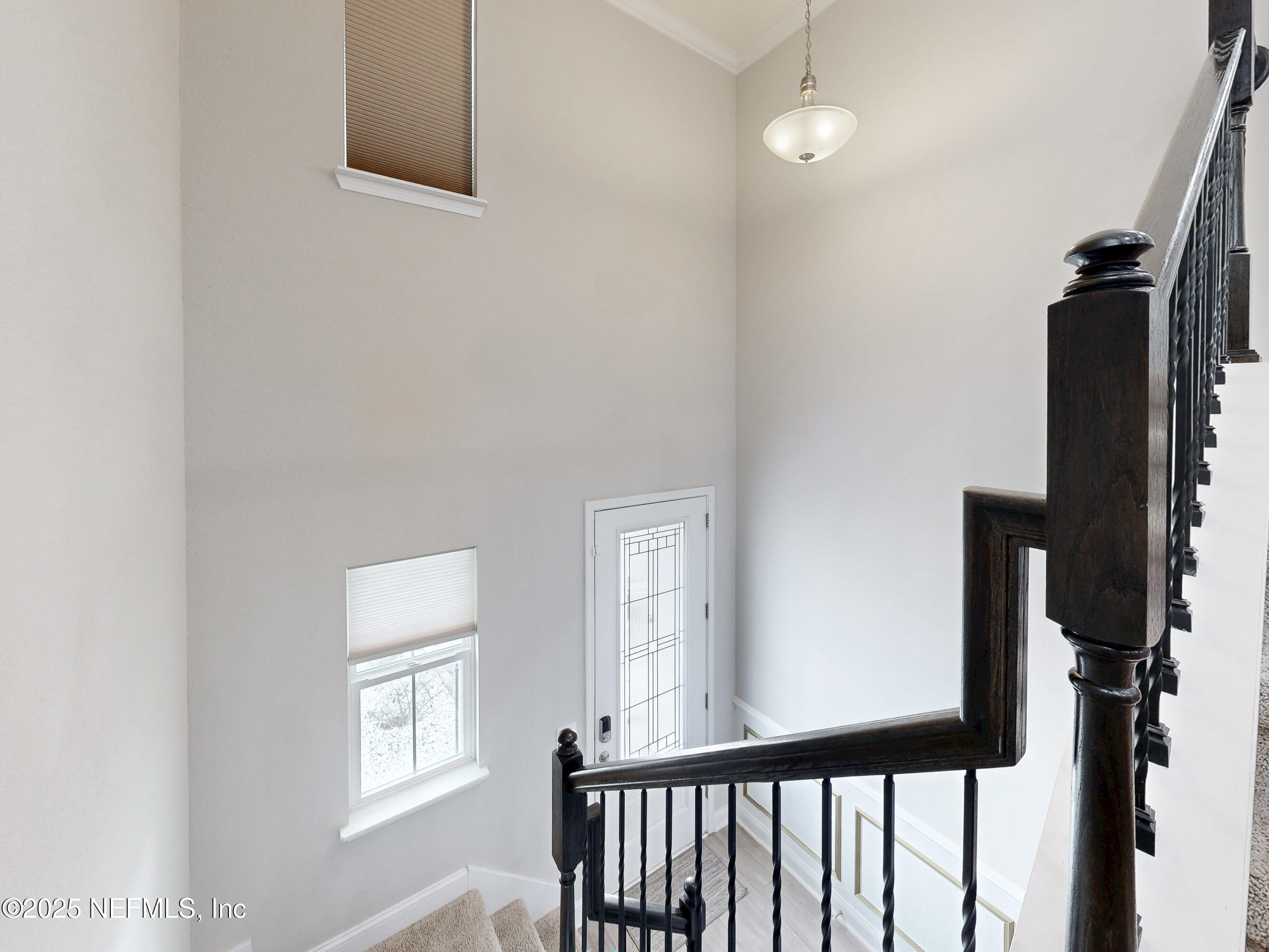 210 Thistleton Way Street St. Augustine, FL 32092 - Photo 15 of 38 a view of a hallway with windows