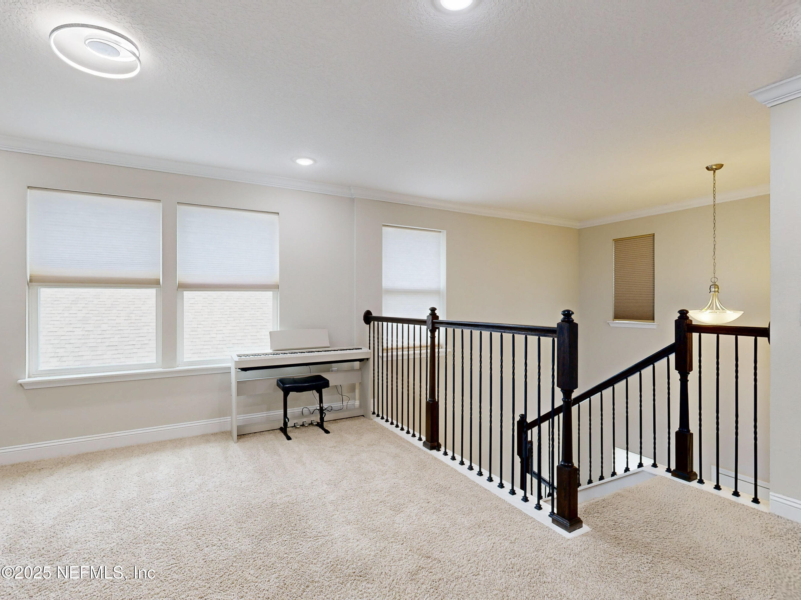 210 Thistleton Way Street St. Augustine, FL 32092 - Photo 18 of 38 a view of a livingroom with furniture and a window