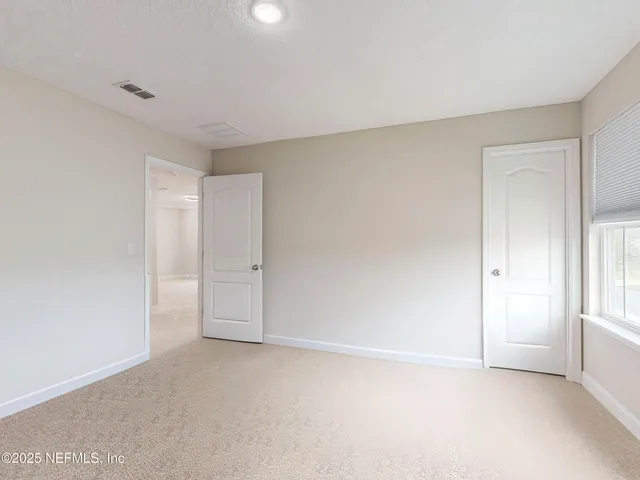 an empty room with a window