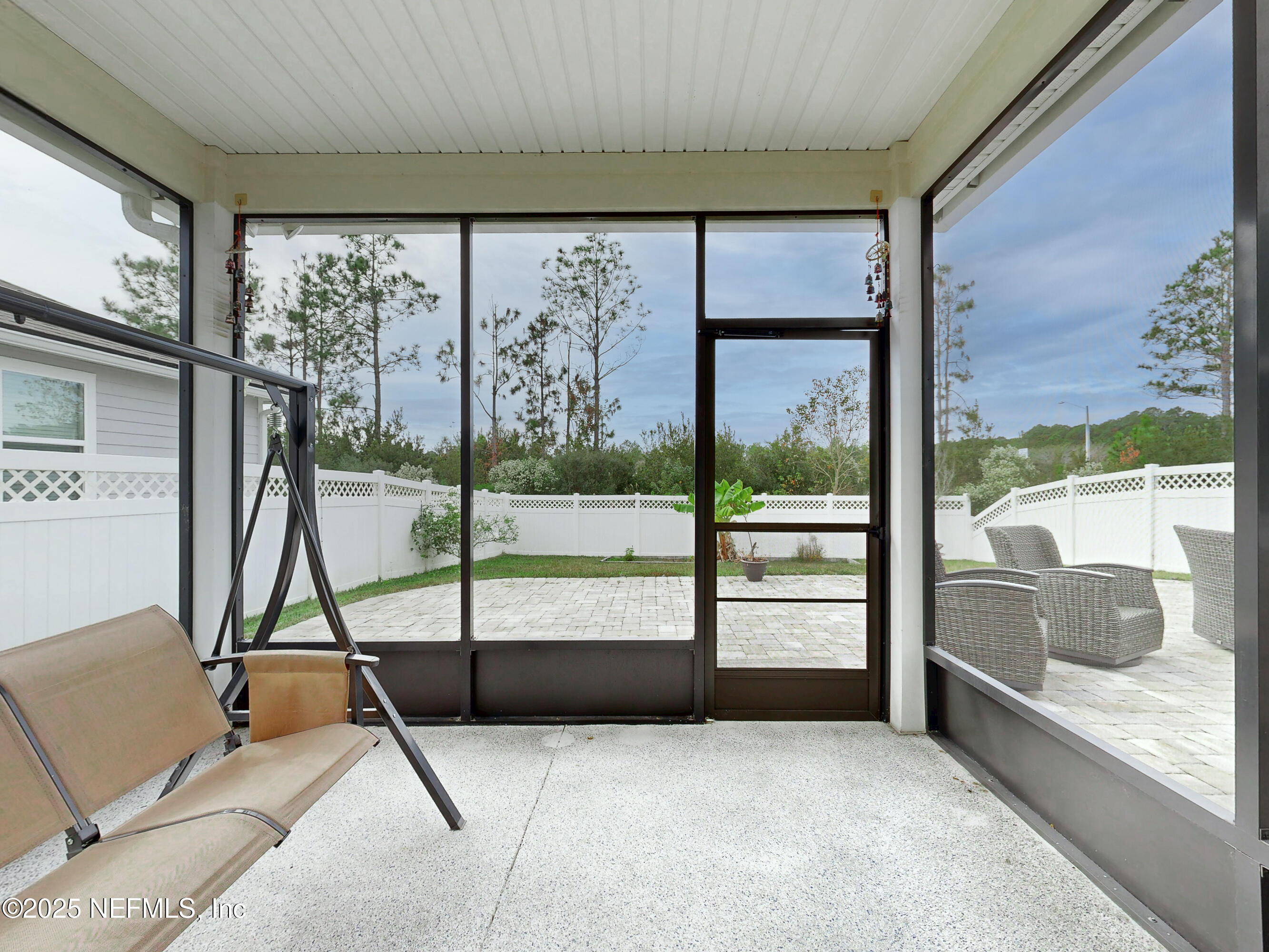 210 Thistleton Way Street St. Augustine, FL 32092 - Photo 28 of 38 a living room with a large window