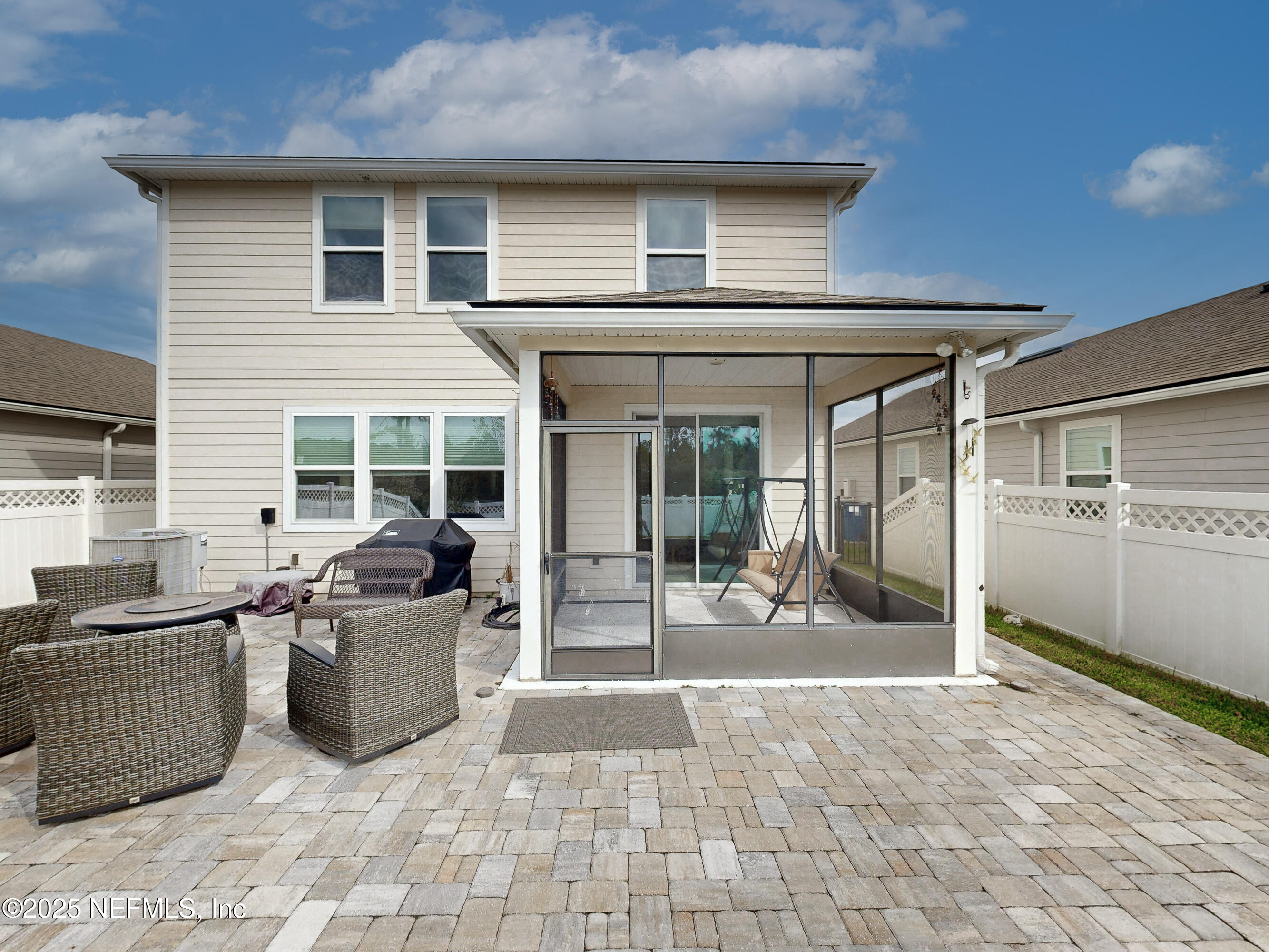 210 Thistleton Way Street St. Augustine, FL 32092 - Photo 30 of 38 a view of a patio with table and chairs in patio