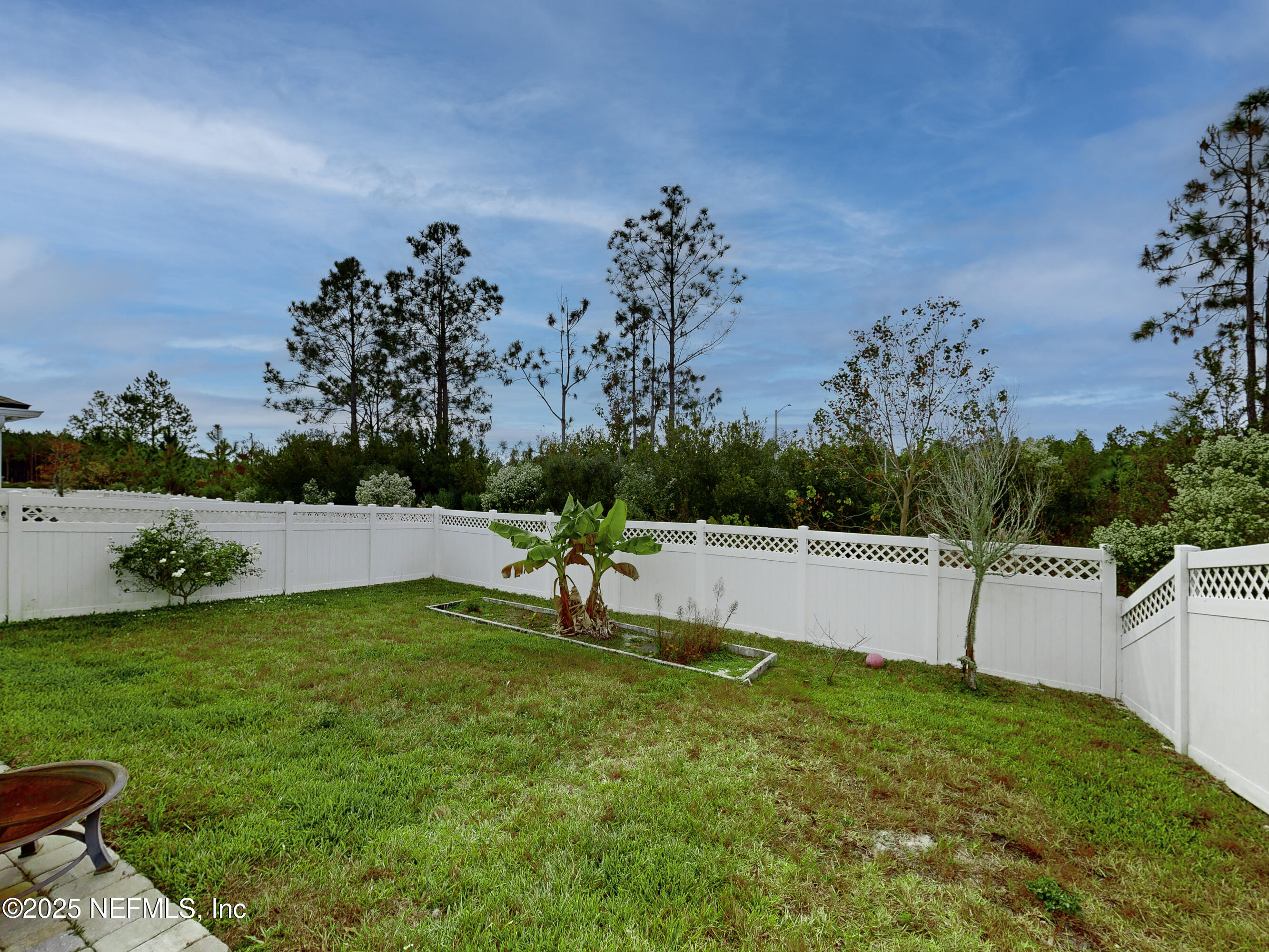 210 Thistleton Way Street St. Augustine, FL 32092 - Photo 31 of 38 a view of a backyard