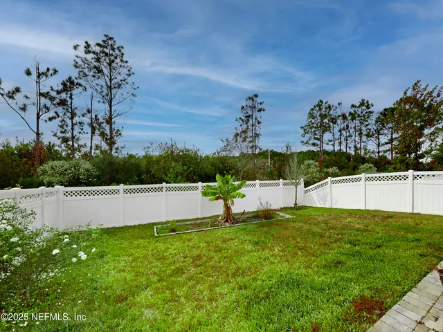 a view of swimming pool with outdoor seating