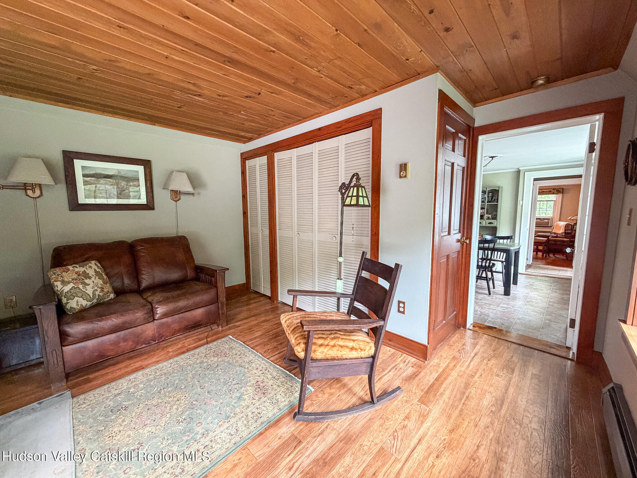 221 Camp Medusa Road Rensselaerville, NY 12120 - Photo 5 of 57 a living room with furniture and wooden floor