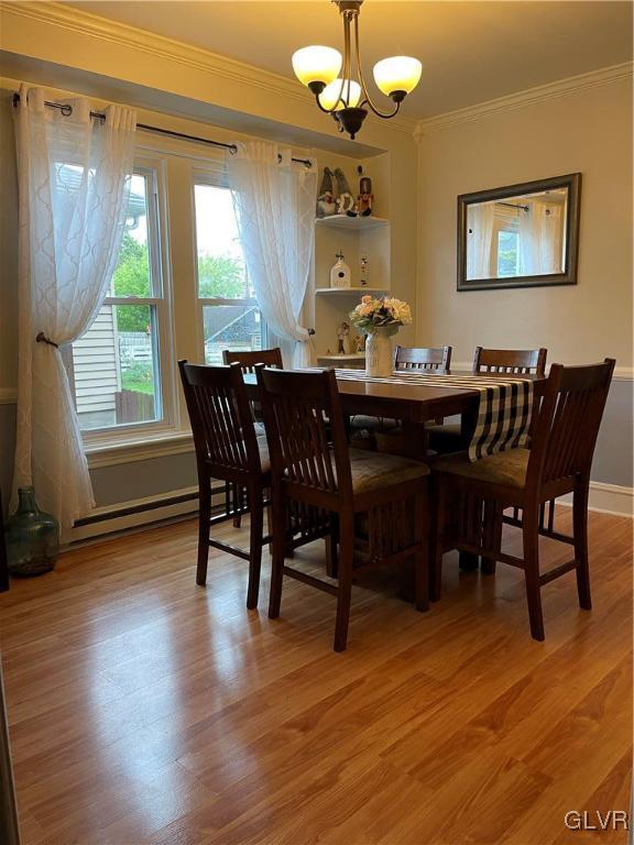 819 Spring Street Bethlehem, PA 18018 - Photo 4 of 18 a view of a dining room with furniture window and wooden floor