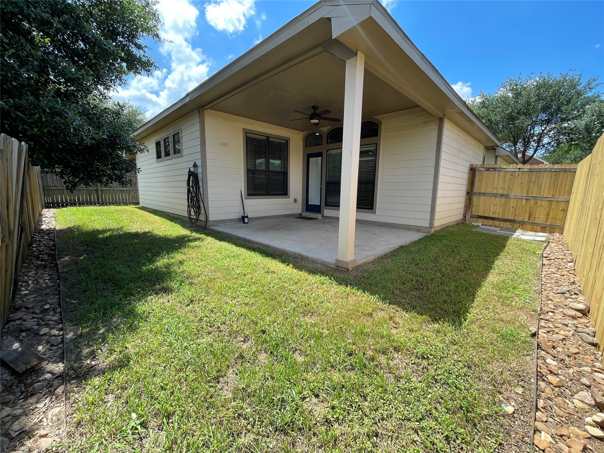 951 Oak Terrace Drive Conroe, TX 77378 - Photo 19 of 19 a view of a backyard with small cabin