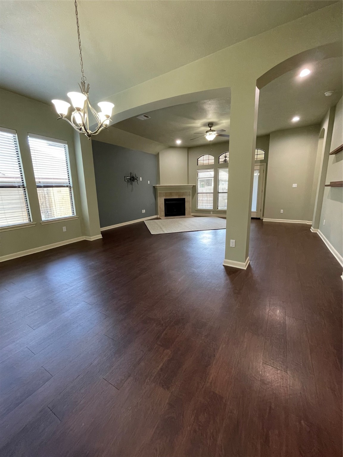 951 Oak Terrace Drive Conroe, TX 77378 - Photo 8 of 19 a view of an empty room with window and wooden floor