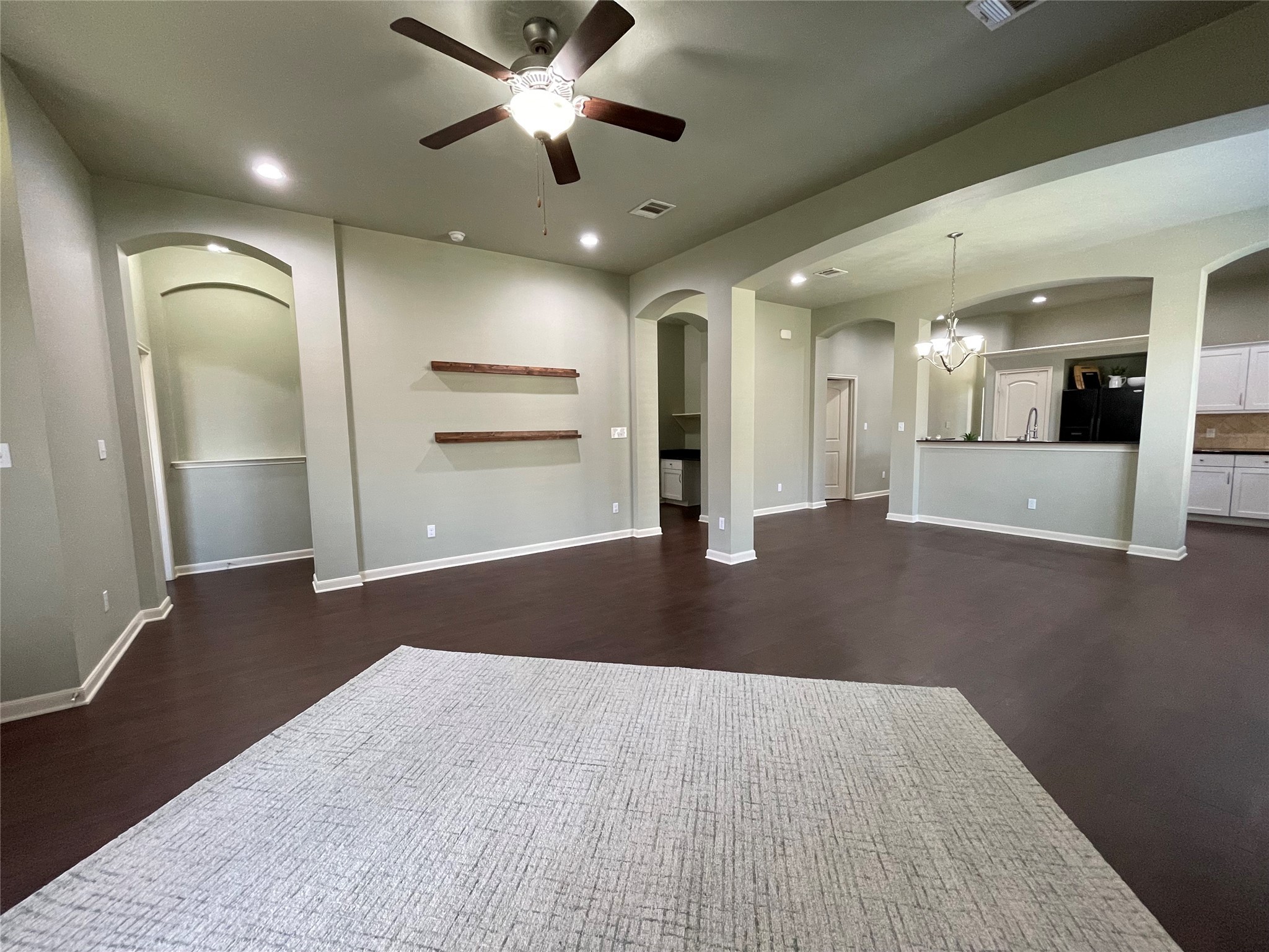 951 Oak Terrace Drive Conroe, TX 77378 - Photo 10 of 19 a view of an empty room and kitchen view