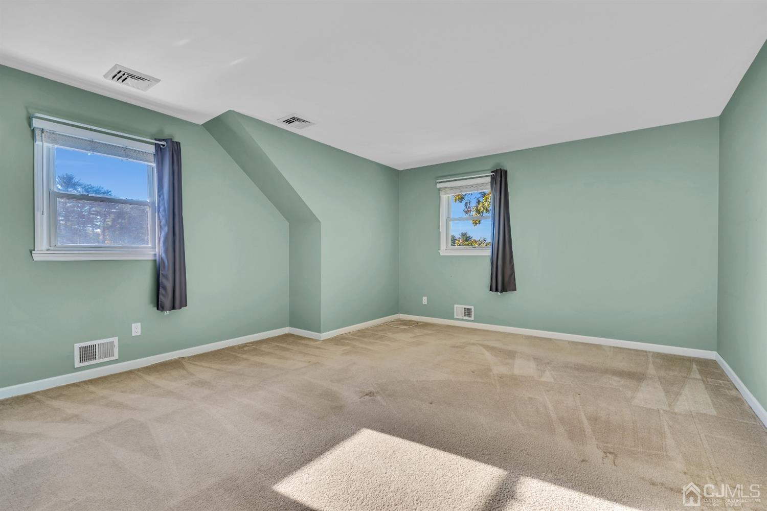 39 Latham Circle Sayreville, NJ 08859 - Photo 16 of 31 a view of a room with painting on the wall