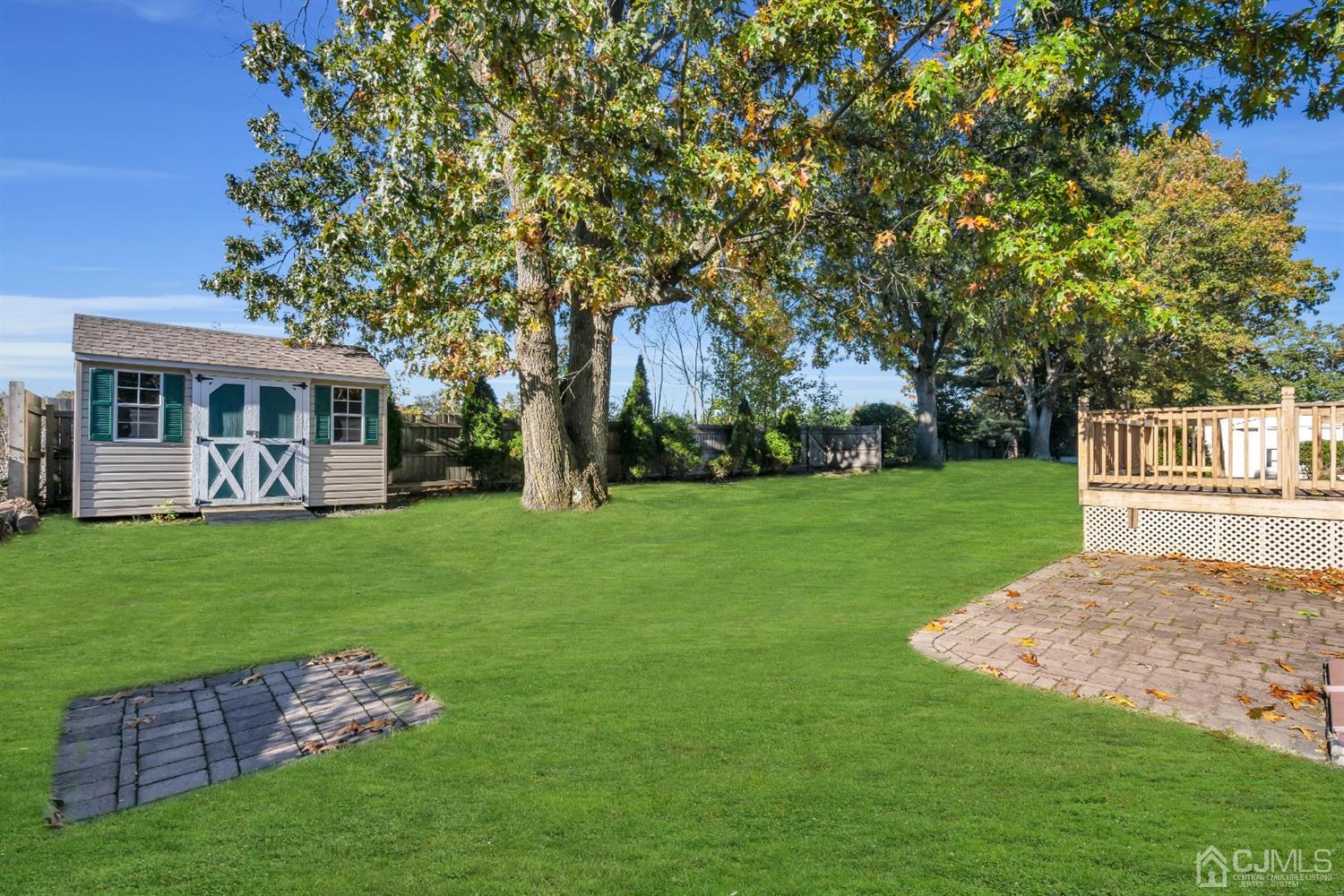 39 Latham Circle Sayreville, NJ 08859 - Photo 30 of 31 a view of a house with a yard