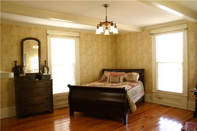 38 Crystal Ridge Road Mulberry, TN 37359 - Photo 13 of 20 a bedroom with a bed and a dresser