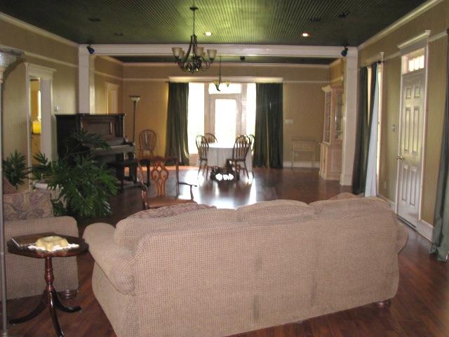 38 Crystal Ridge Road Mulberry, TN 37359 - Photo 7 of 20 a large bedroom with a large bed and a chandelier