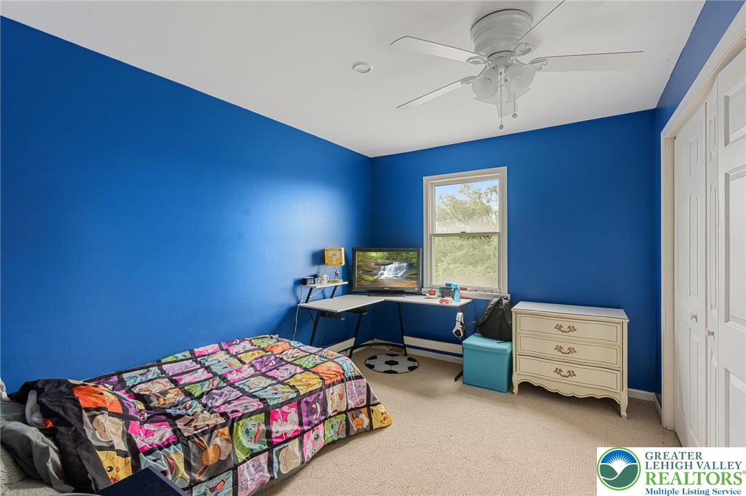 271 Maple Street Coplay, PA 18037 - Photo 17 of 25 a bedroom with a bed and a window