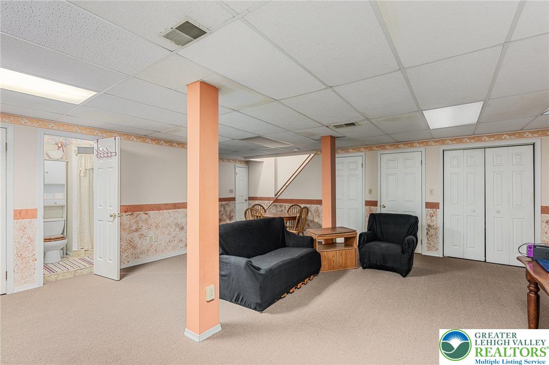 271 Maple Street Coplay, PA 18037 - Photo 19 of 25 a living room with furniture and a flat screen tv