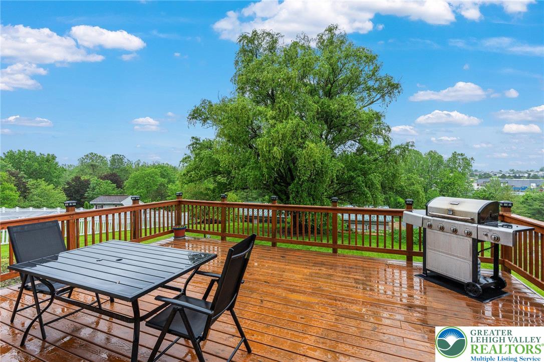 271 Maple Street Coplay, PA 18037 - Photo 23 of 25 a view of a deck with wooden floor and barbeque oven