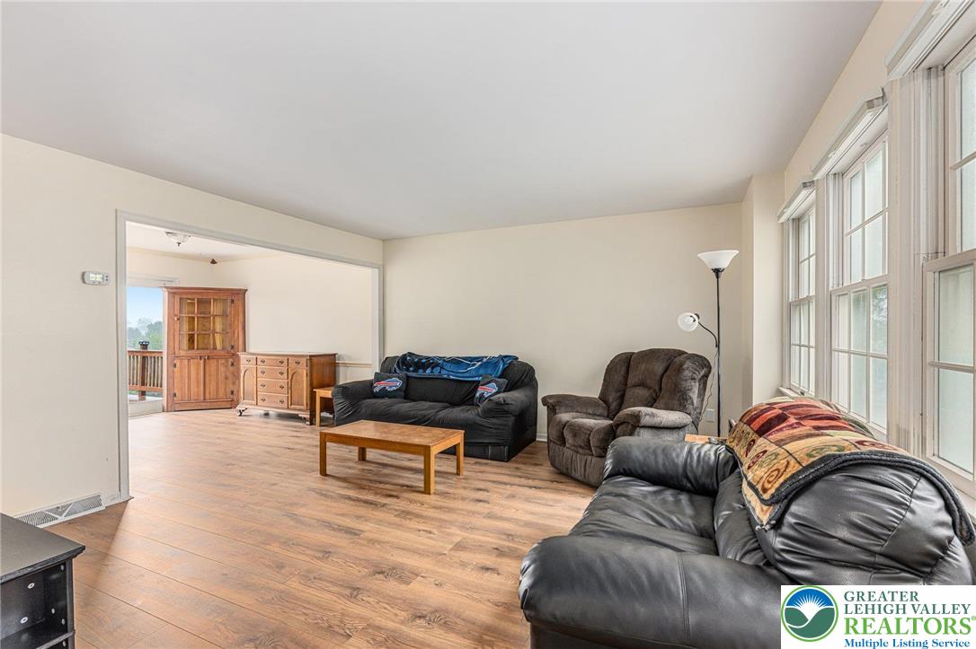 271 Maple Street Coplay, PA 18037 - Photo 4 of 25 a living room with furniture and a window