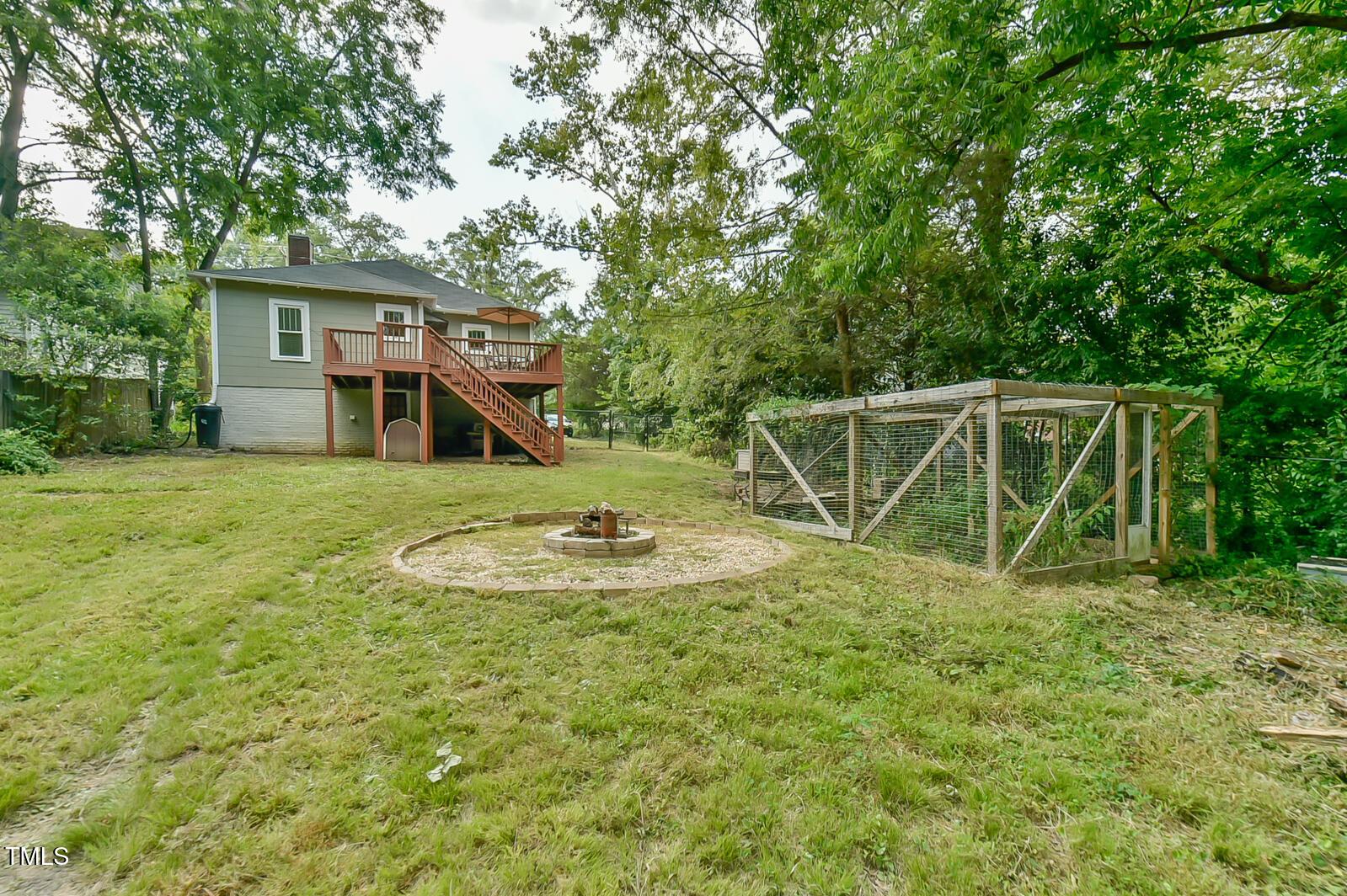 2909 Chapel Hill Road Durham, NC 27707 - Photo 26 of 39 Firepit and chicken enclosure.