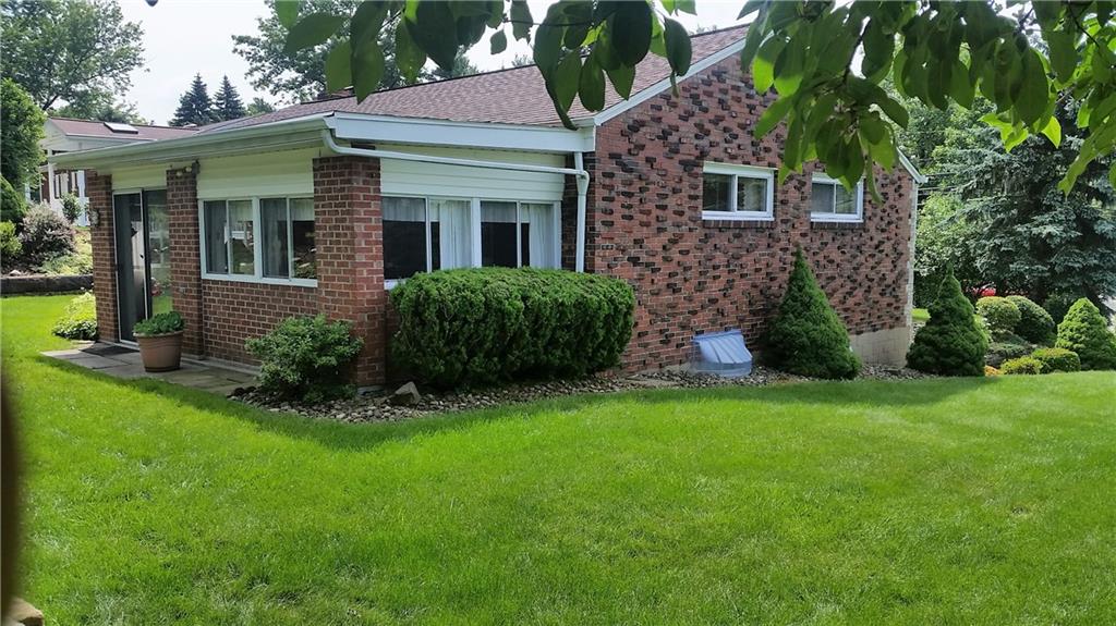 132 Siebert Road Pittsburgh, PA 15237 - Photo 2 of 23 Back of home, featuring the 3 season room.
