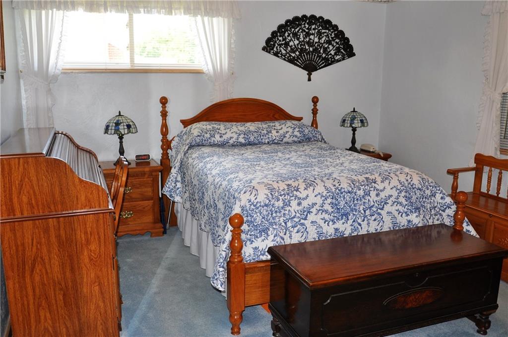 132 Siebert Road Pittsburgh, PA 15237 - Photo 18 of 23 Master bedroom, original hardwood floors under carpeting. (15x12)
