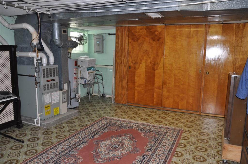 132 Siebert Road Pittsburgh, PA 15237 - Photo 21 of 23 Large, dry basement, with built in closet, bar, and mini fridge. Washer and Dryer are also included.