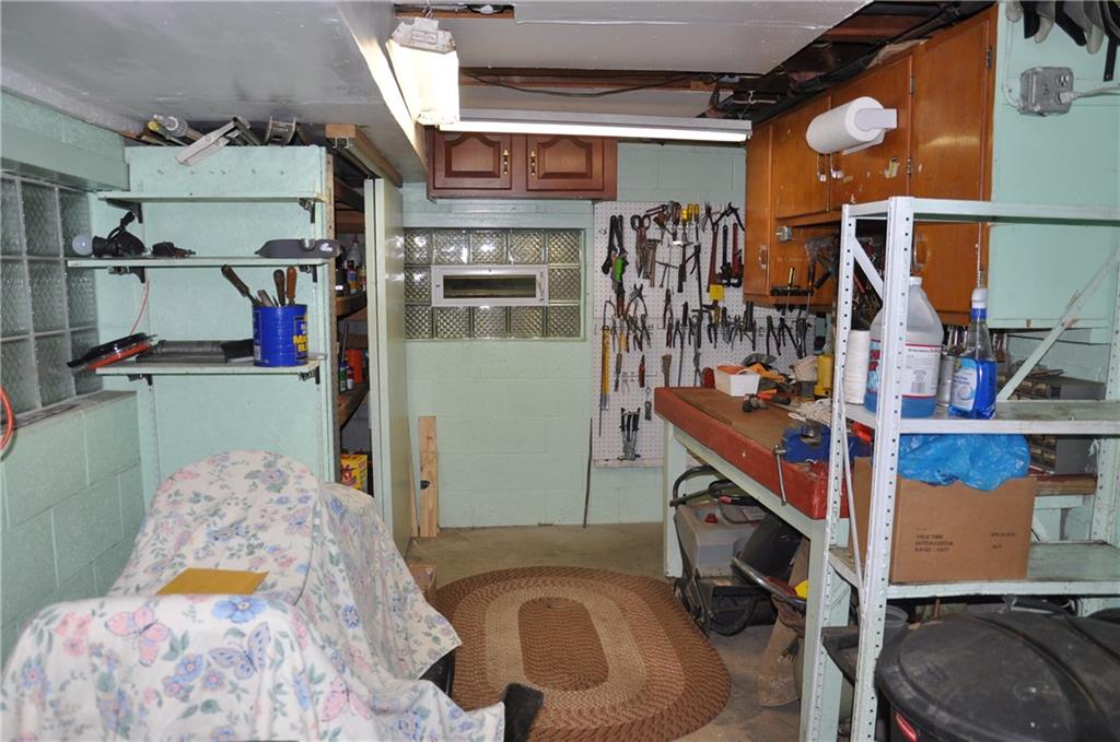 132 Siebert Road Pittsburgh, PA 15237 - Photo 22 of 23 Storage and work area off the garage. ( 14x9)
